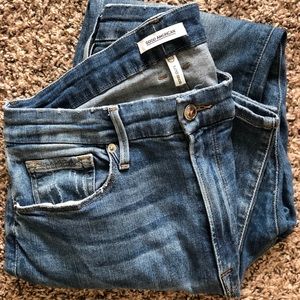 Good American distressed blue jeans